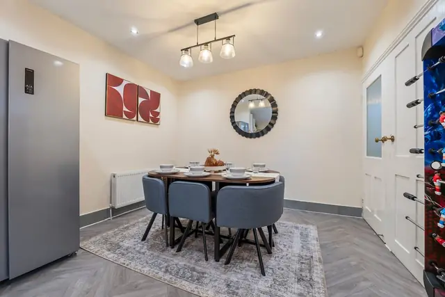 Dining area and fridge freezer
